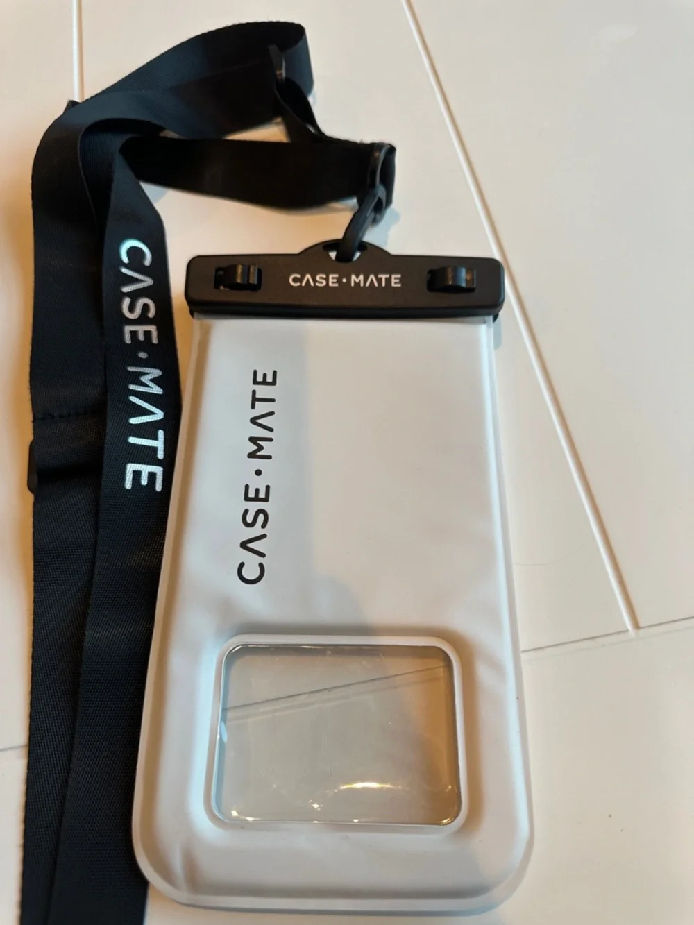 case-mate White Waterproof Phone Pouch with Black Lanyard and Clear Window